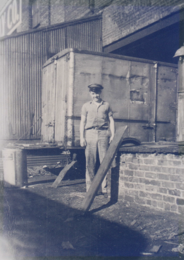 Founder C.J."Bud" Calabria working on the docks, as a young man.